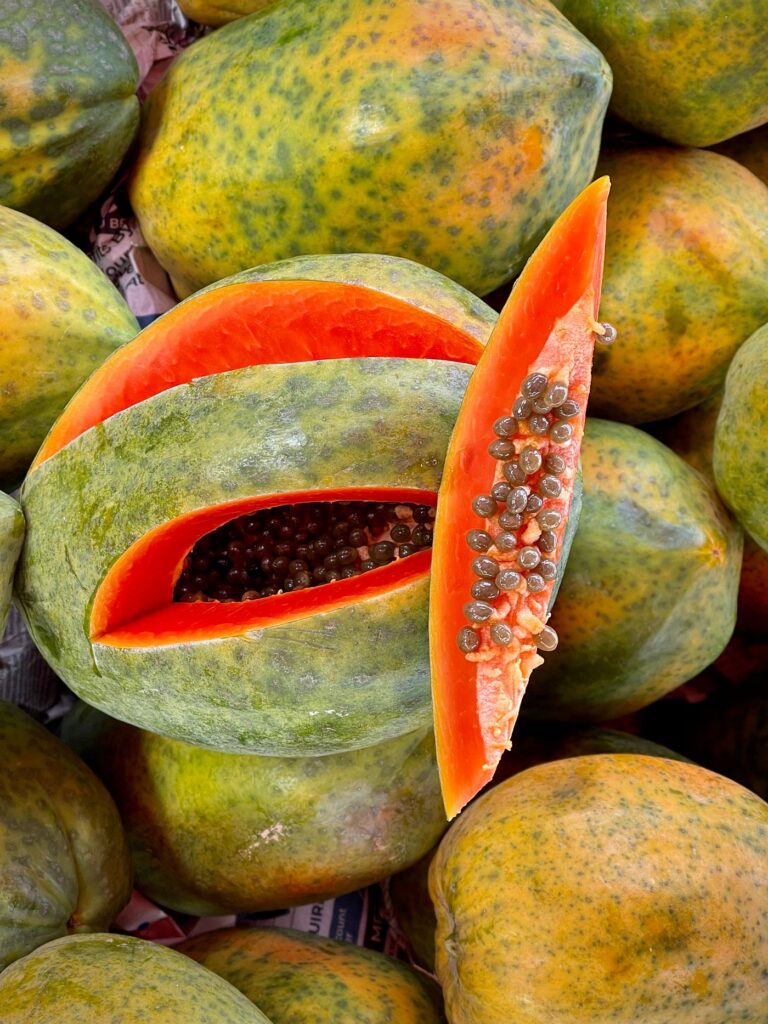 Ripe papayas on display showing rich orange colour